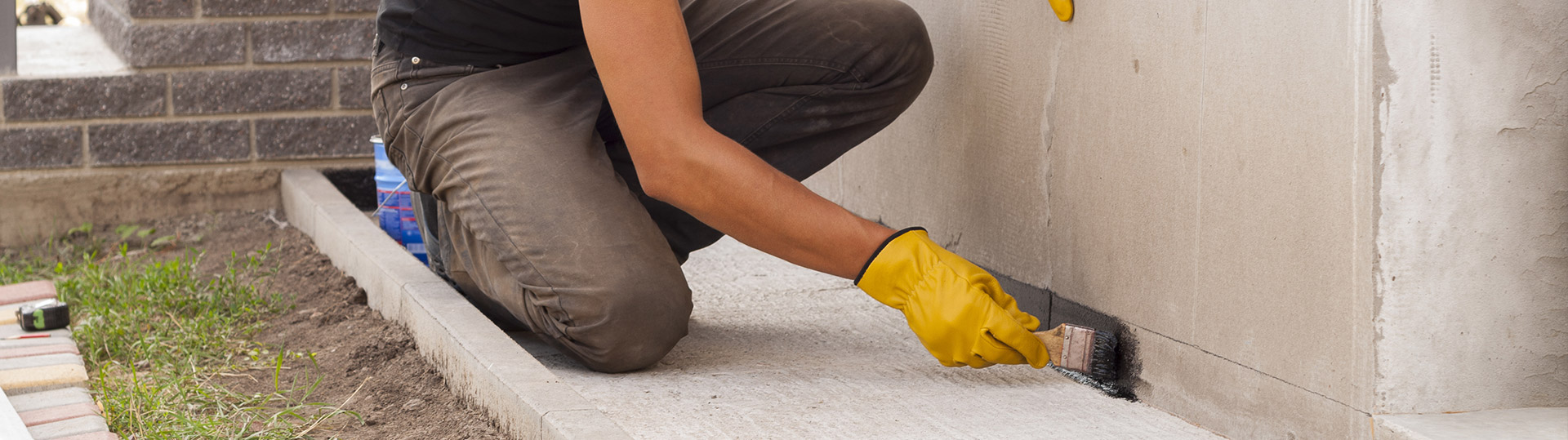 Man finishing a concrete repair job