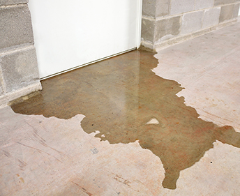 Pooling water in basement before basement waterproofing
